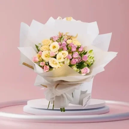 لمسة من الفرح – باقة ورد وردي وأصفر بتنسيق أنيق